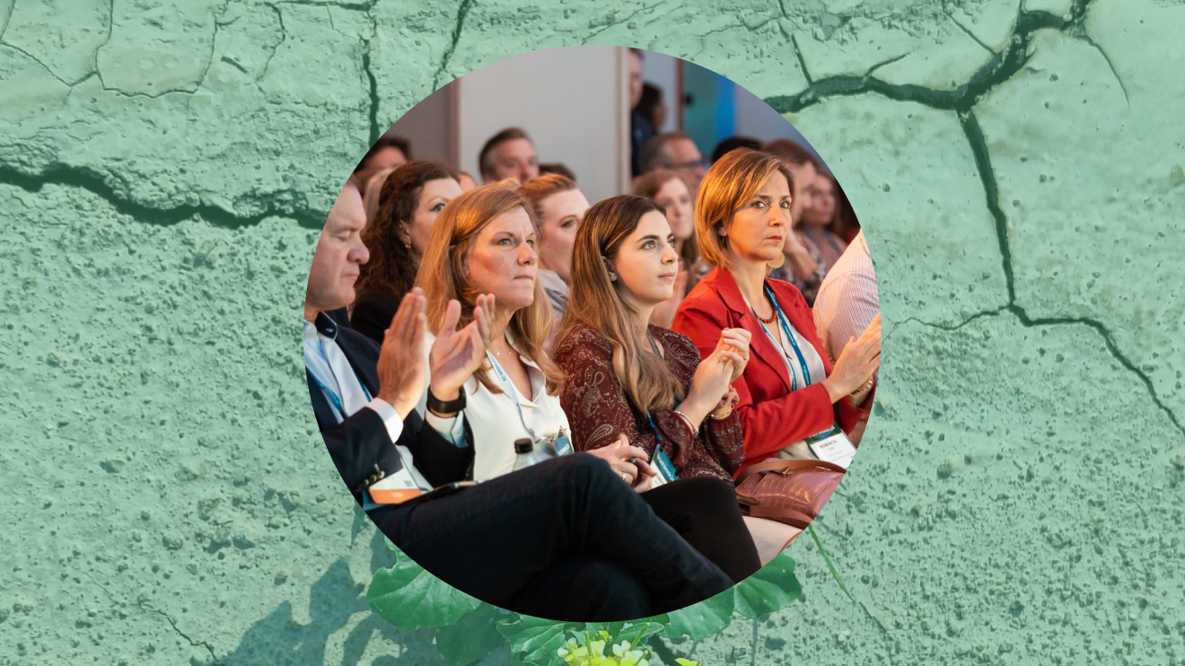 Photo of an audience clapping