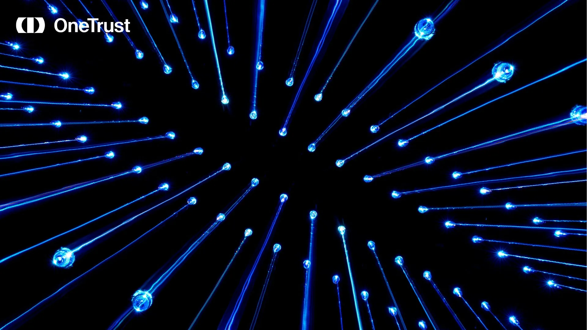 Glowing blue data lines radiating across a black background with the OneTrust logo in the upper-left corner.