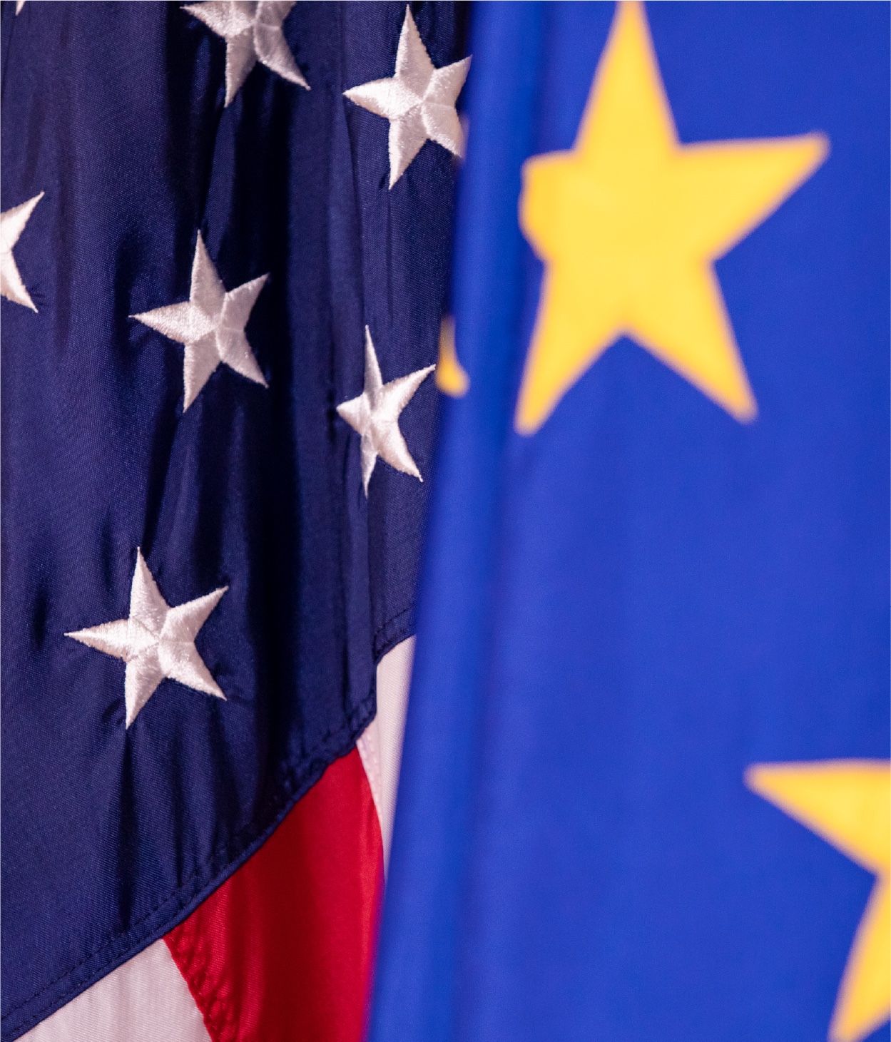 Close-up photo of the US and EU flags