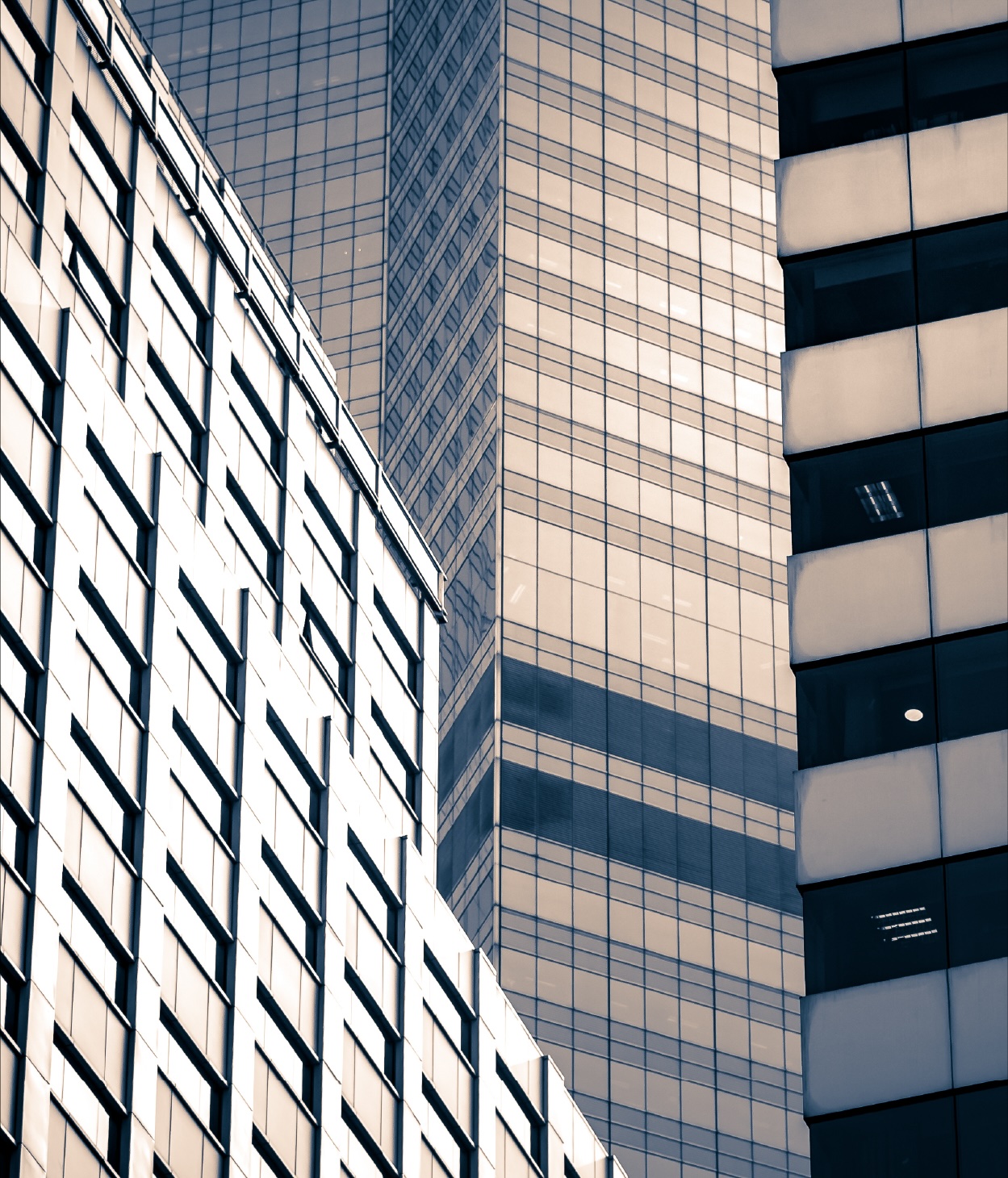 Low-angle photo of office buildings