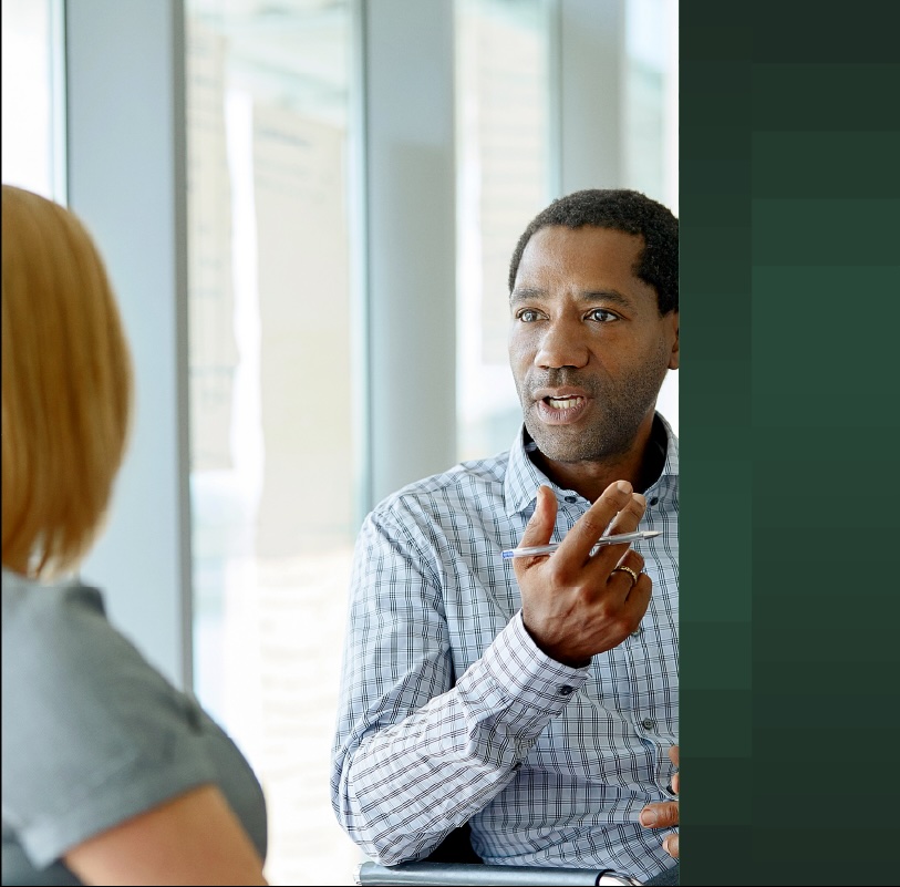 Salesman speaking to a customer