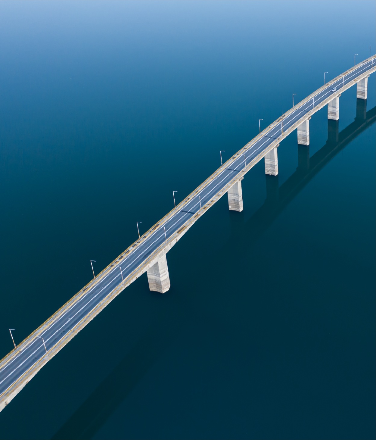 Long bridge over water illustration