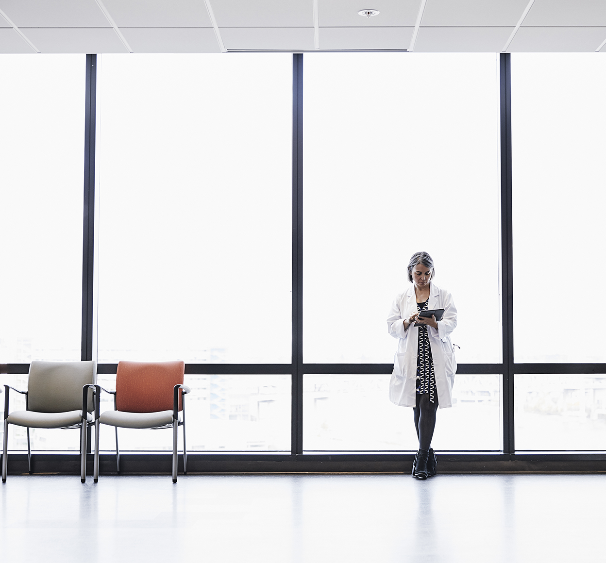 Female doctor using a tablet