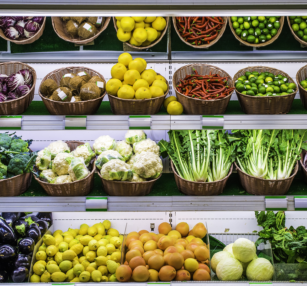 Fruits and vegetables in a supermarket aisle