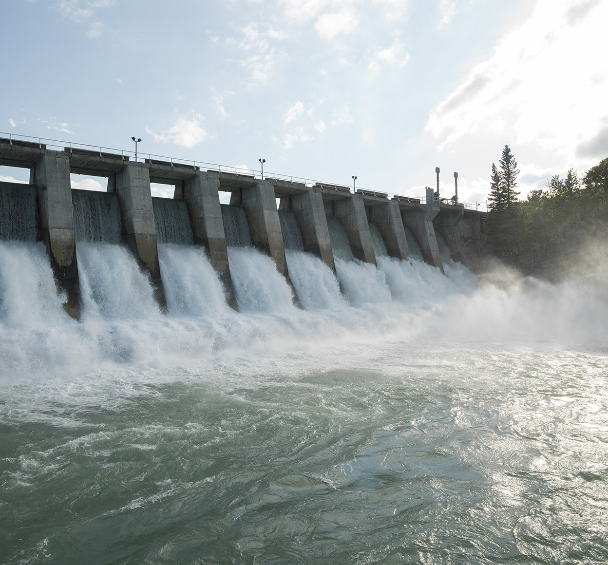 hydroelectric dam during spring runoff full water