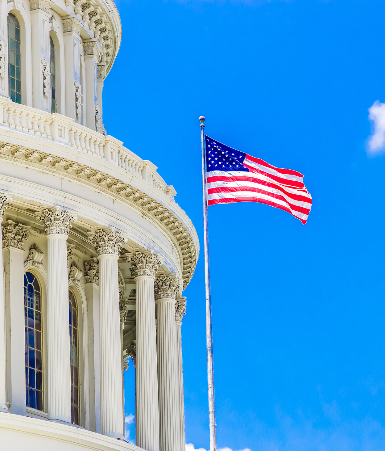 US flag outside the US Capitol building