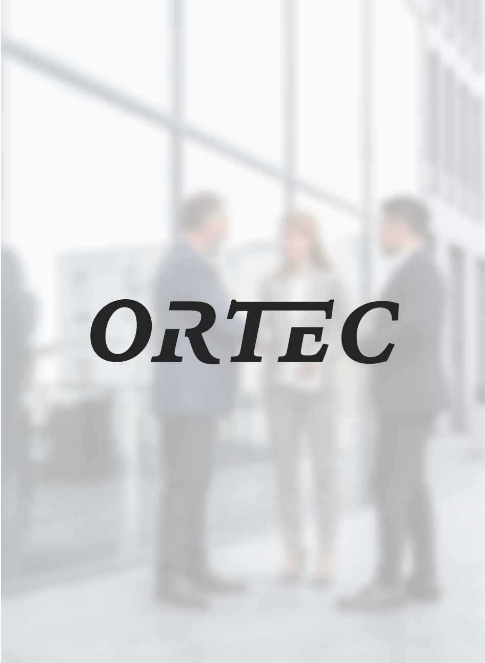 Ortec logo on top of blurred image of colleagues in an office hallway