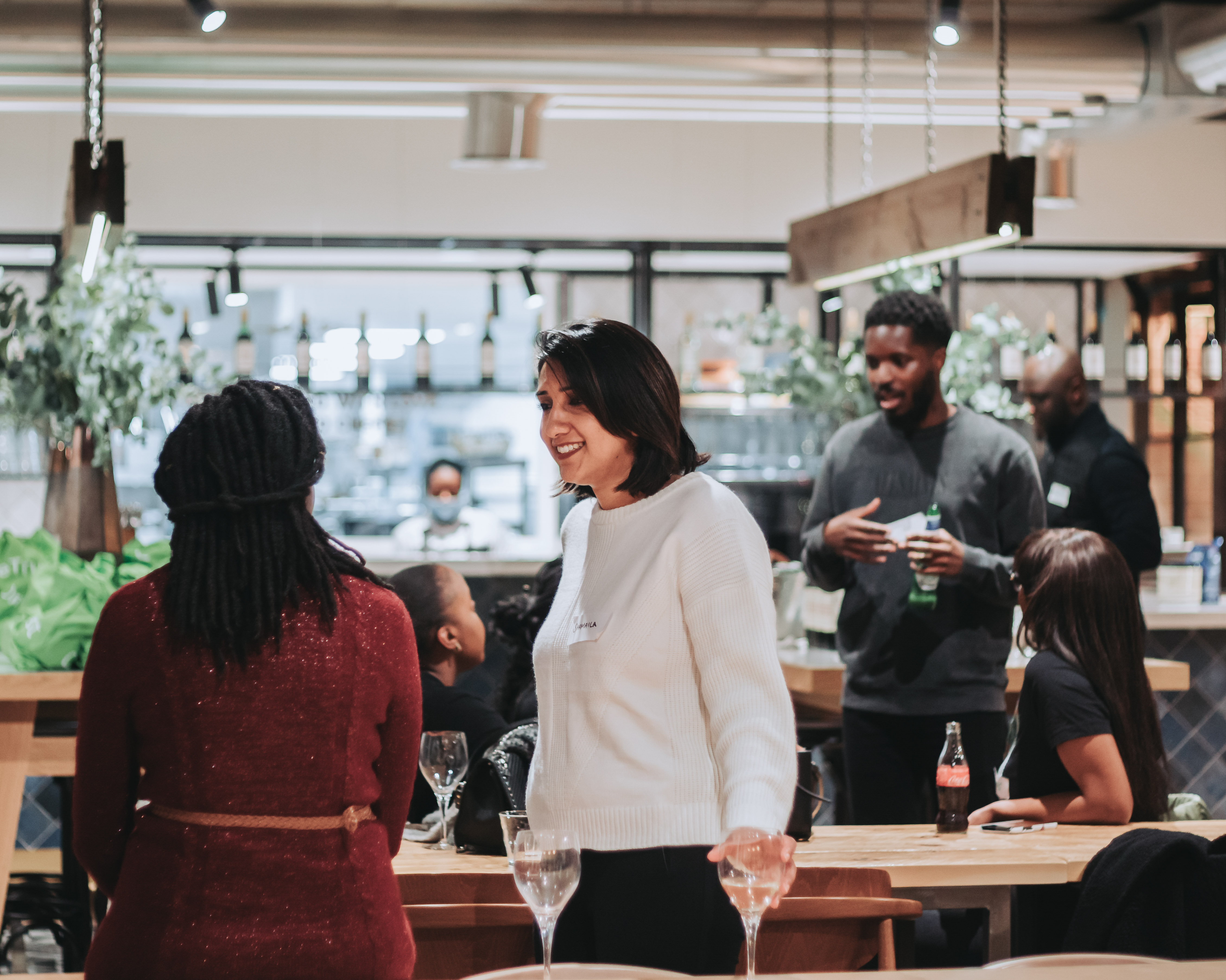 A group of OneTrust employees celebrating a Black@OneTrust event.