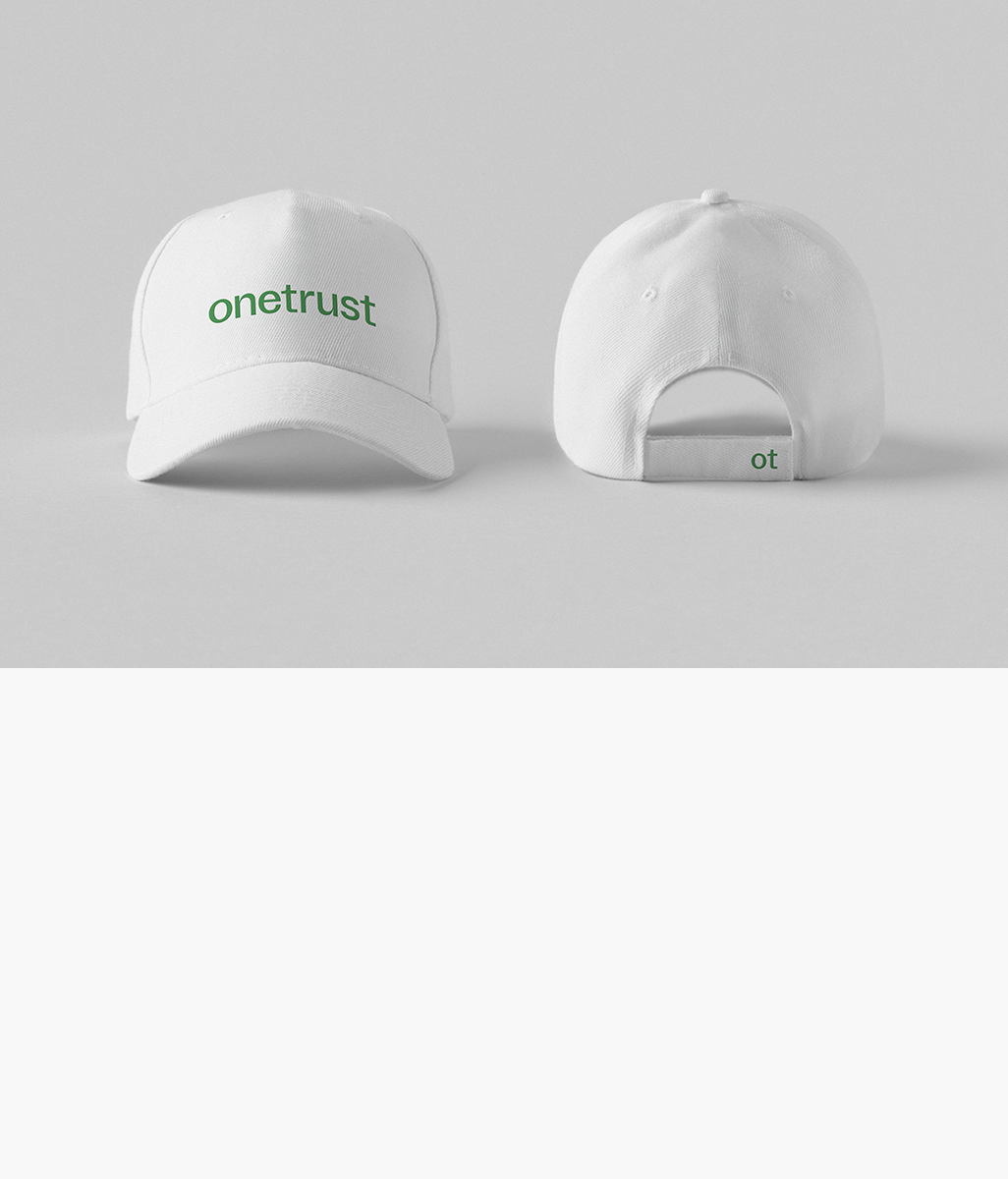 OneTrust logo embroidered on the front of a white hat and the OneTrust monogram embroidered on the back